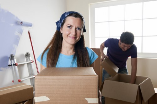 Man and van team loading furniture for a house move