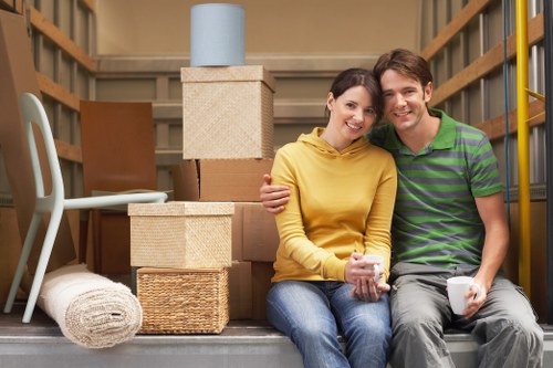 Removal van being loaded with furniture for a house move in House