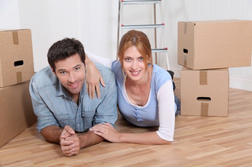 Packed household boxes and furniture ready for removal service
