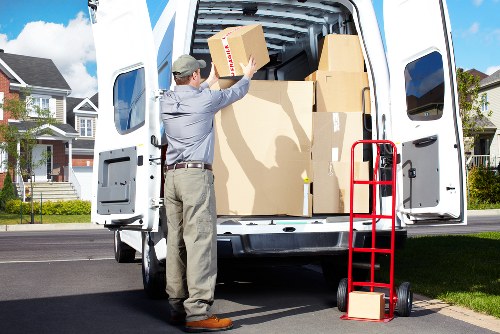 House move planning with boxes and moving equipment