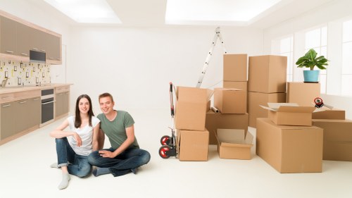 Careful loading of household furniture into a moving truck