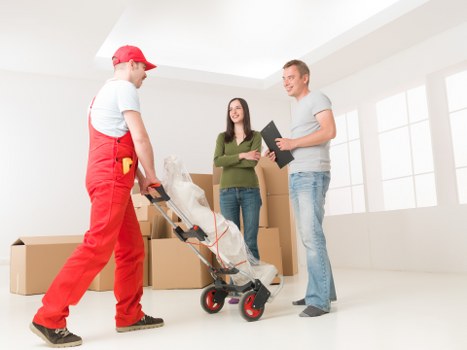 Professional local movers handling access challenges during a house removal