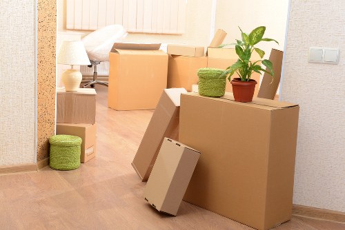 Moving office items through a narrow hallway in a house